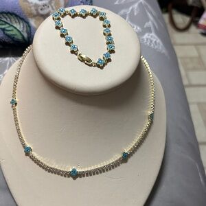 Gold-Tone Necklace and Bracelet Set with Blue Floral Accents